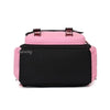 A pink and black canvas backpack with brown leather straps.