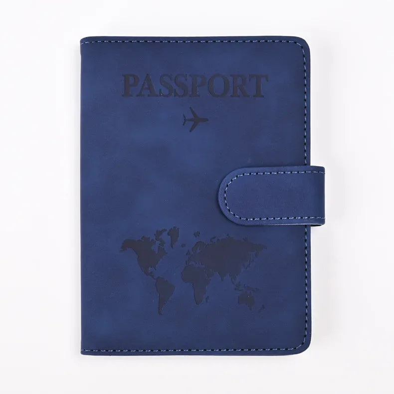 A dark blue genuine PU leather passport wallet cover featuring the word PASSPORT and a world map design.