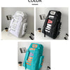 A set of three waterproof travel gym backpacks in white, black, and teal colors shown from the side.