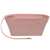 Bolsa cosmética de fieltro rosa con cremallera y bolsillo separado para organización de bolso.
