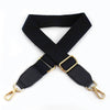 Black canvas cotton bag strap with gold metal hooks, shown in an X-shape.