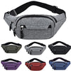 A collection of canvas waist fanny bags in various colors including gray black purple red and blue.