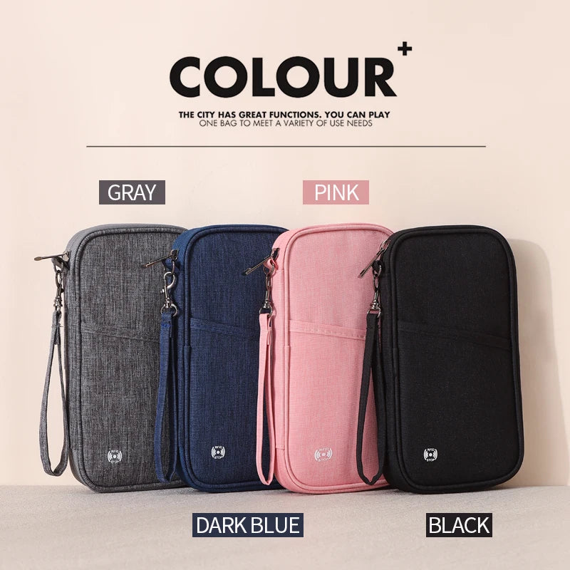 Un juego de cuatro carteras de pasaporte bloqueadoras RFID en gris, azul oscuro, rosa y negro mostradas una al lado de la otr