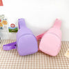 A pair of purple and pink nylon crossbody bags for kids displayed on a checkered surface.