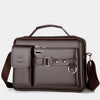 A dark brown men's PU leather crossbody shoulder bag with a padded flap and strap.