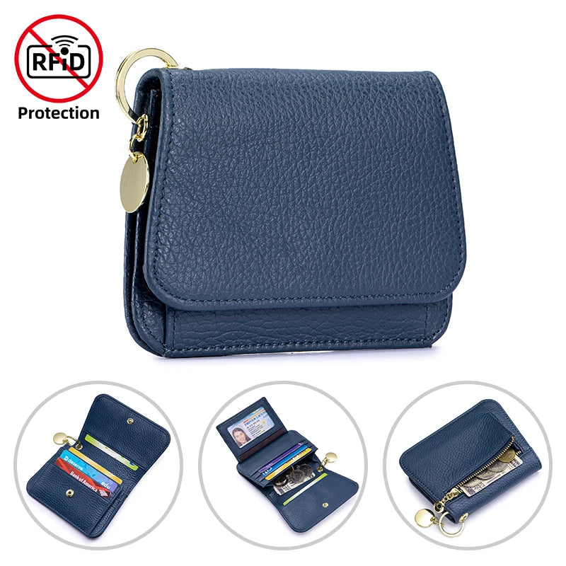 A dark blue genuine leather slim tri-fold wallet with a zipper pouch and gold hardware.