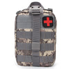 A gray and tan tactical first aid kit pouch with a red cross emblem on the front.