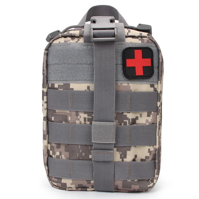 A gray and tan tactical first aid kit pouch with a red cross emblem on the front.
