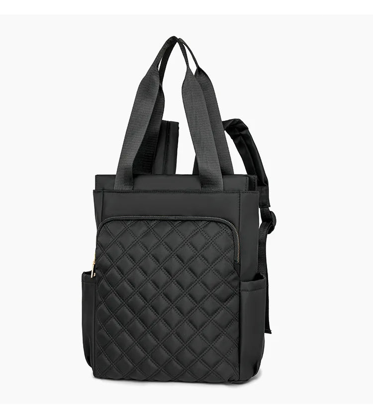Black quilted women's backpack tote bag with adjustable straps