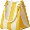 A yellow and cream striped knit bucket tote bag with gold hardware.