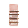 A pink portable detachable makeup bag with multiple zippered compartments for travel.