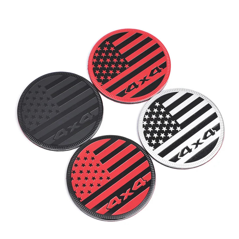 Four variations of round American flag car decals featuring red and black stripes and stars