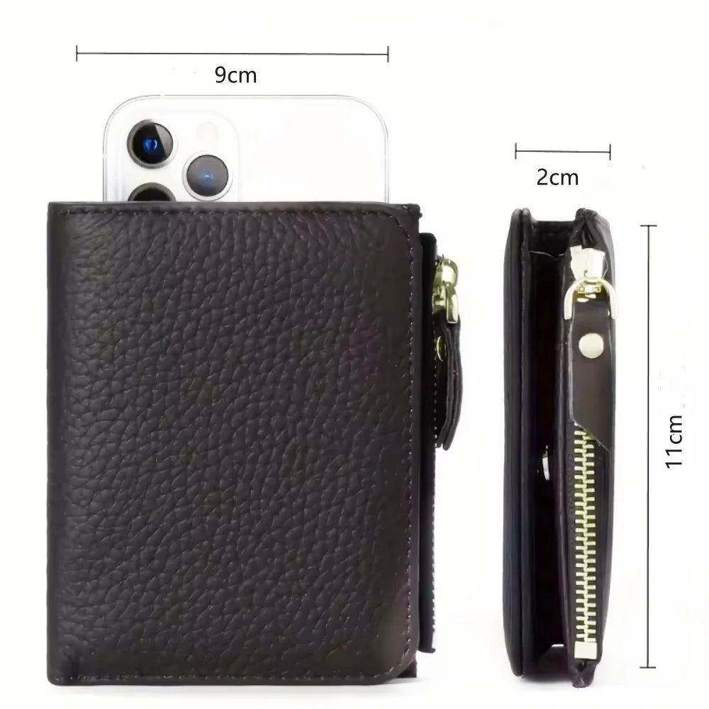 A black genuine leather slim bi-fold wallet shown next to an iPhone for scale.