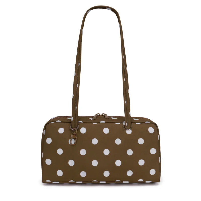A brown nylon shoulder tote bag with white polka dots.