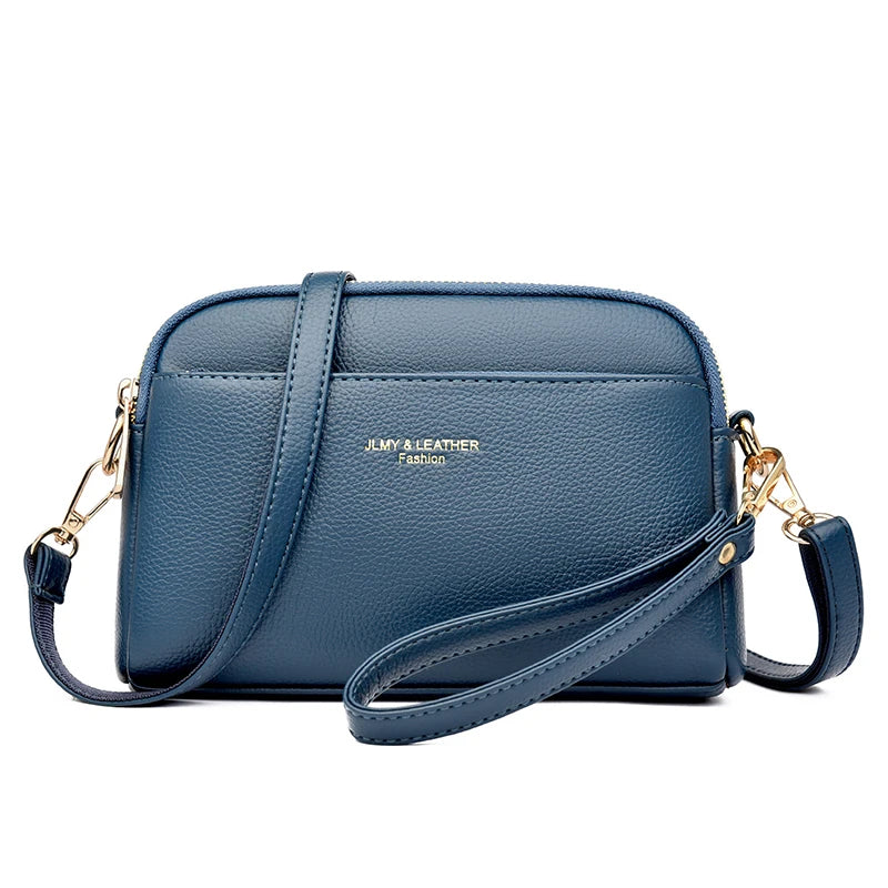 A navy blue PU leather trendy shoulder crossbody bag with gold hardware.