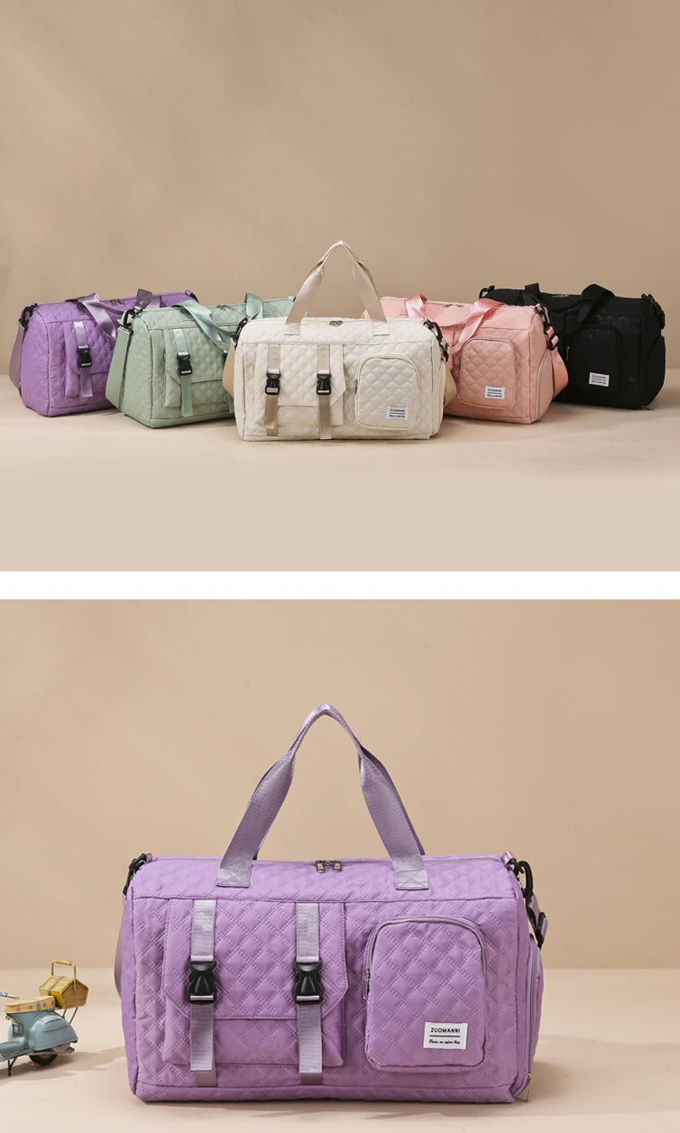 A purple nylon travel duffle bag with an argyle pattern is shown in a studio setting.