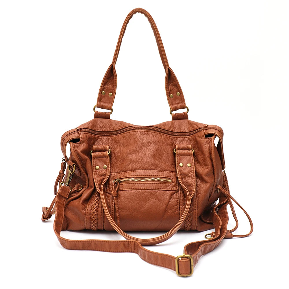 Braune Vintage-PU-Leder-Tasche mit mehreren Reißverschlusstaschen und Lederriemen.