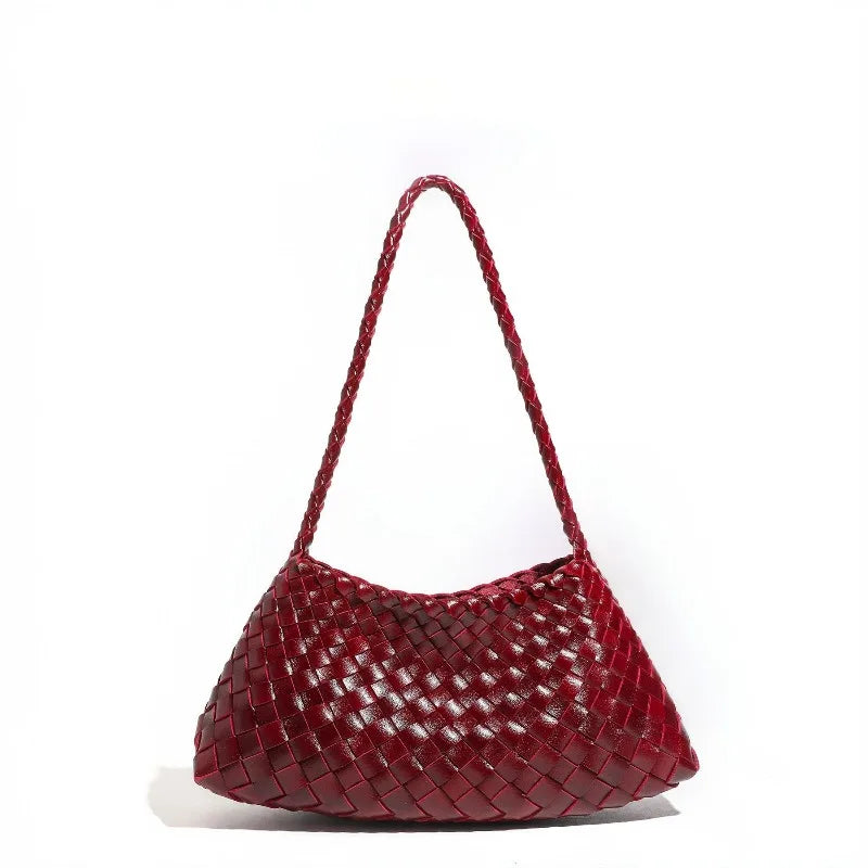 A deep red handwoven PU shoulder bag with a textured, woven pattern.