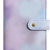 A purple and white marbled leather ring binder notebook with a light blue elastic closure.