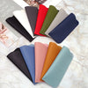 Colección de fundas para gafas de cuero PU en varios colores como negro, rojo, verde, beige y azul.