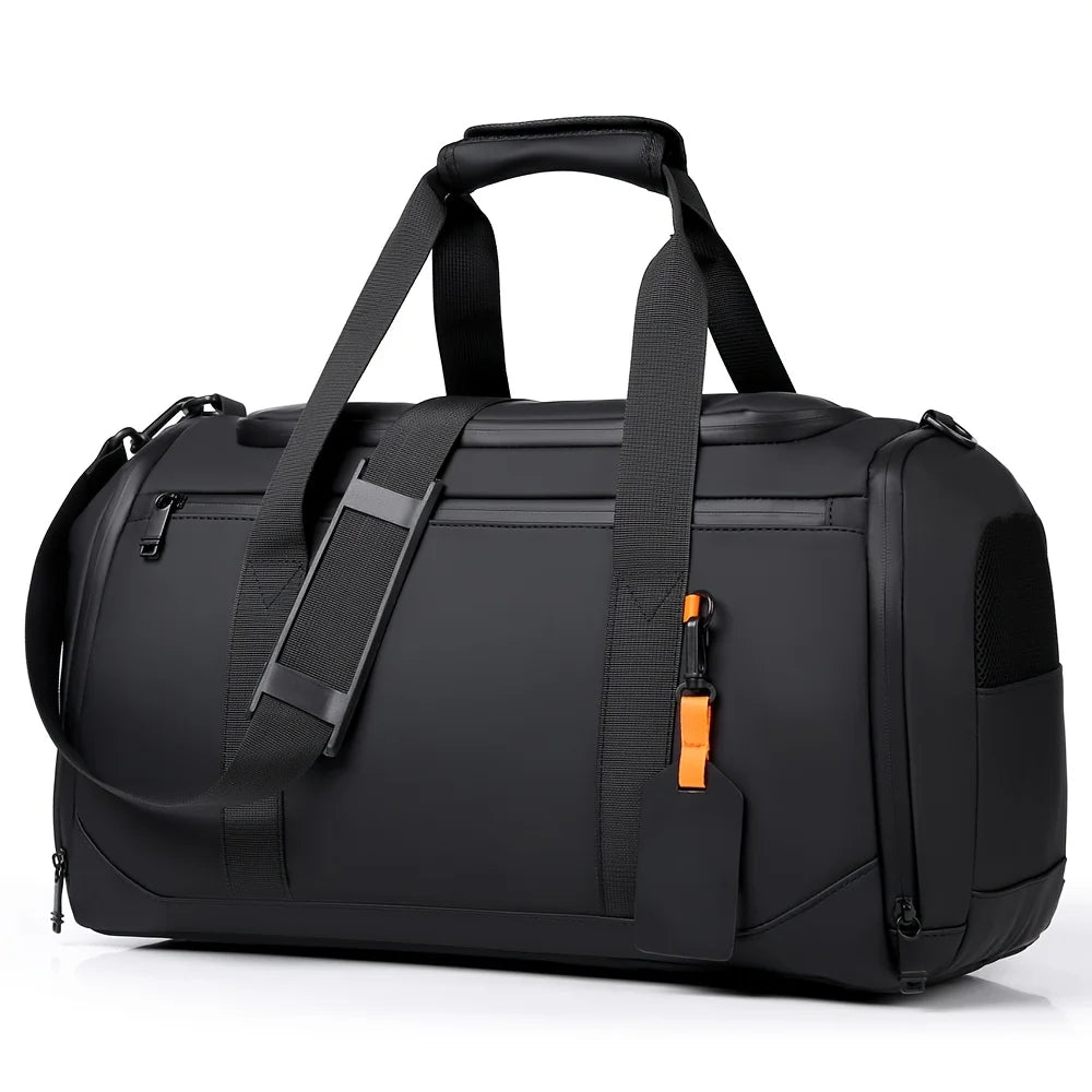 A black large capacity travel duffel bag with padded straps and buckles.
