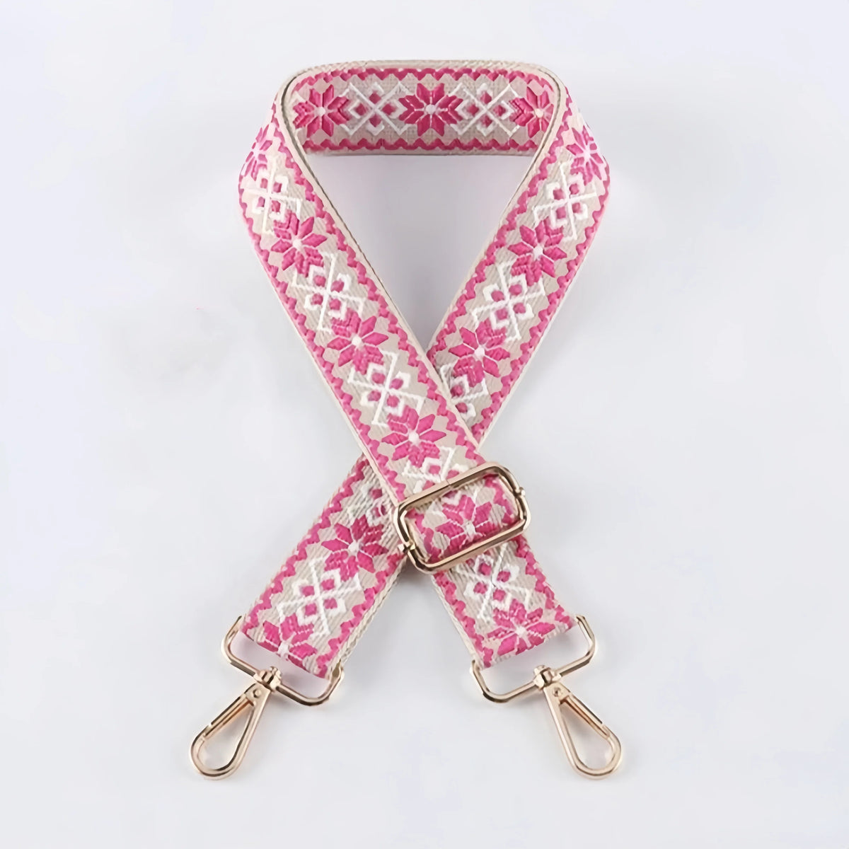 Pink and white patterned replacement bag strap with gold-toned adjustable buckles