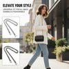 A woman models a white blazer and jeans while carrying a black bag with an elegant metal chain crossbody strap.