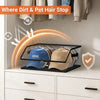 A clear stackable hat organizer with a black base is shown on a white dresser, demonstrating where dirt and pet hair stop.