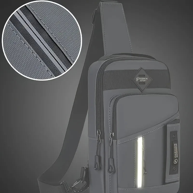 A gray nylon crossbody sling bag with a textured fabric detail and adjustable strap.