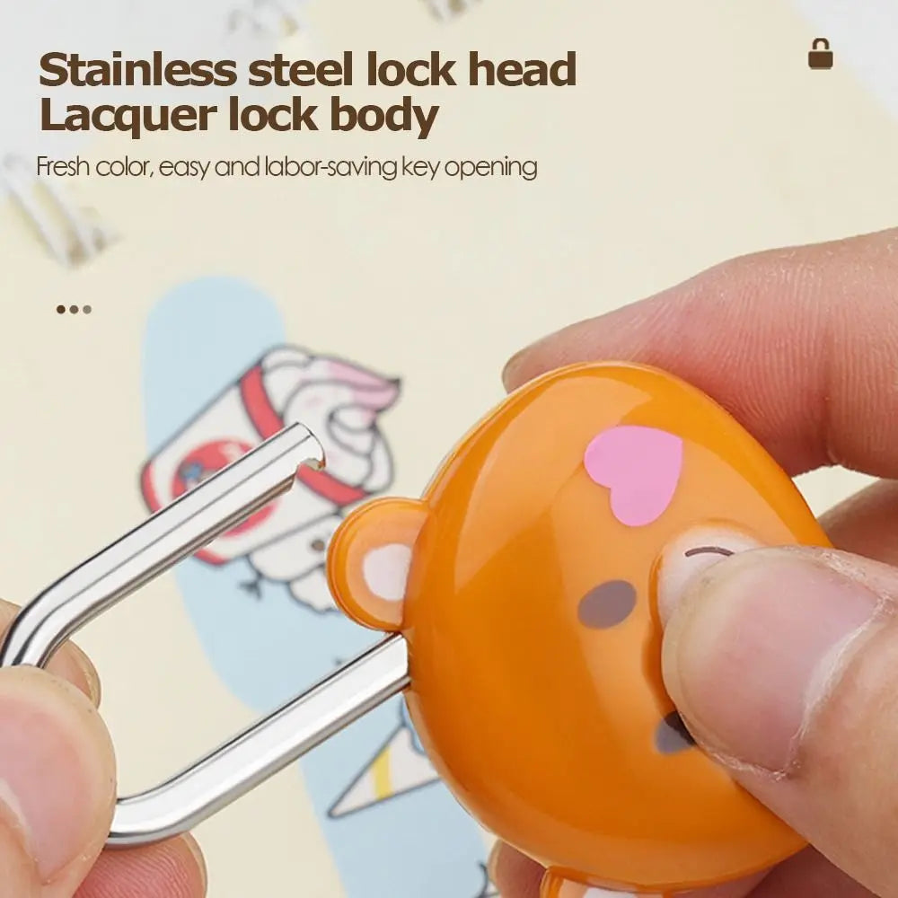 Hand holding an orange cartoon padlock with a silver key, showing the lock head and body.
