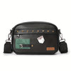 Black PU leather crossbody messenger bag with gold studs and a green patch.