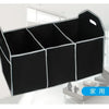 Black multi-pocket car trunk organizer with a foldable design shown in a modern interior setting.