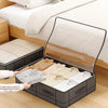 A foldable under-bed storage box with a window is shown open, revealing folded clothing inside.
