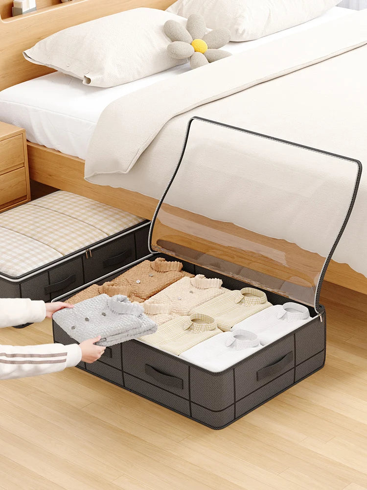 A foldable under-bed storage box with a window is shown open, revealing folded clothing inside.
