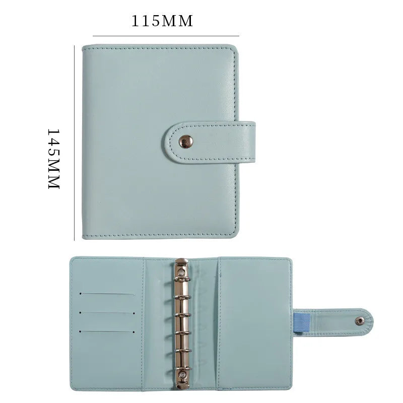 Light blue leather ring binder notebook with a 115mm x 145mm size and a leather cover.