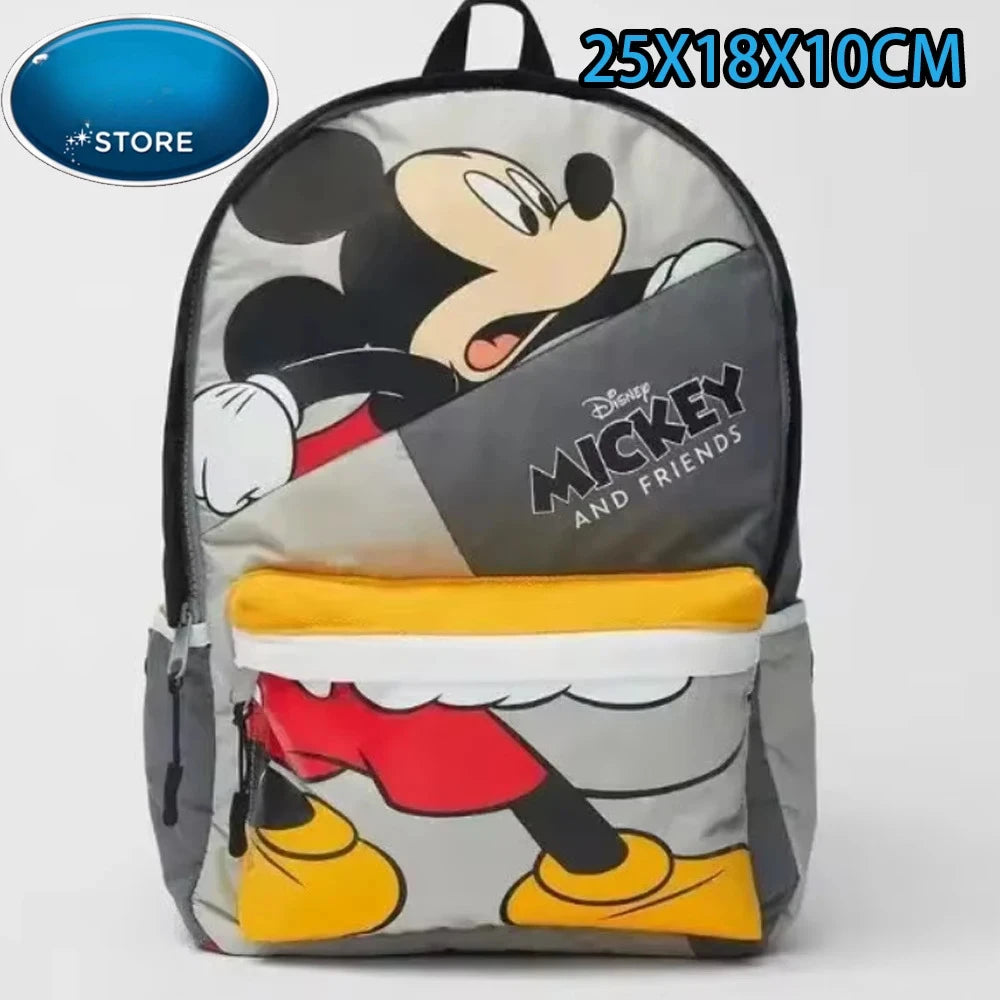 Mochila temática de Mickey y amigos con diseño de ratón de dibujos animados y bolsillo amarillo.