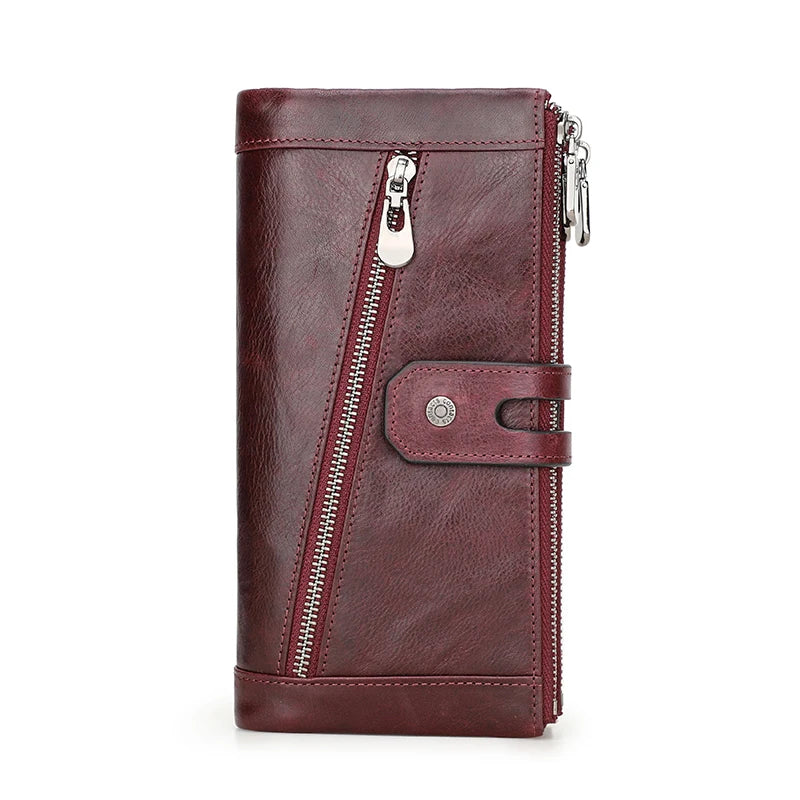 A dark burgundy genuine leather vintage clutch wallet with a zipper and snap closure.