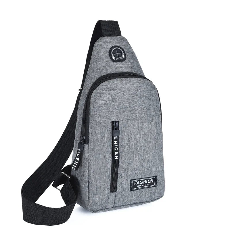 A gray water-resistant casual chest bag with a black strap and a zippered phone pocket.