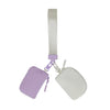 A small purple nylon zip wristlet coin purse with a light gray strap attached.