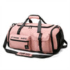 A pink tactical backpack with black accents and straps is shown against a white background.