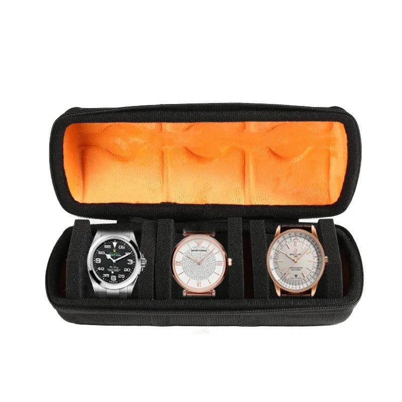 Black watch organizer case with soft orange lining holding three watches.