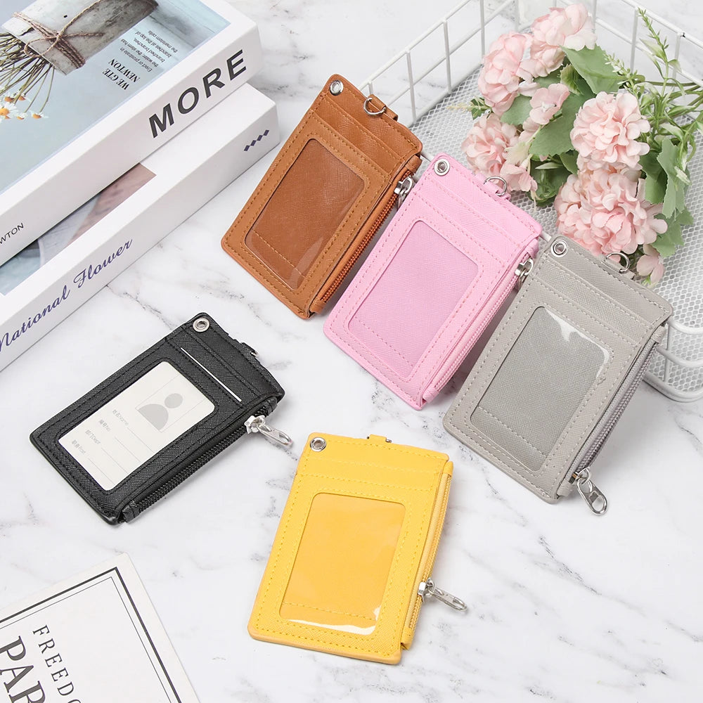 A collection of colorful PU leather card holder wallets in various shades including brown pink gray and yellow displayed on a