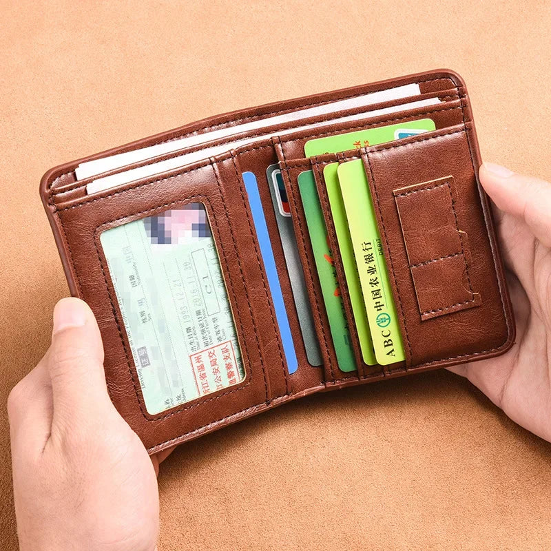 A brown leather men's wallet is shown open, displaying various cards and cash inside.