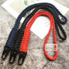 Hand-woven nylon lanyards in blue, black, and red with metal hooks displayed on a white background.