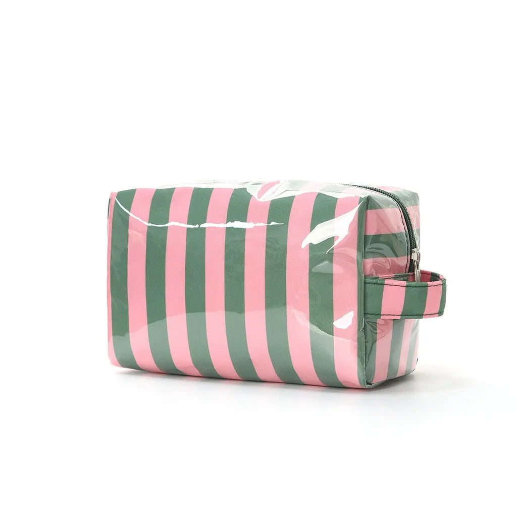 A striped green and pink waterproof cosmetic bag with a zippered closure.