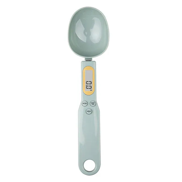 A light gray precision digital kitchen scale with a round weighing bowl and a digital display.
