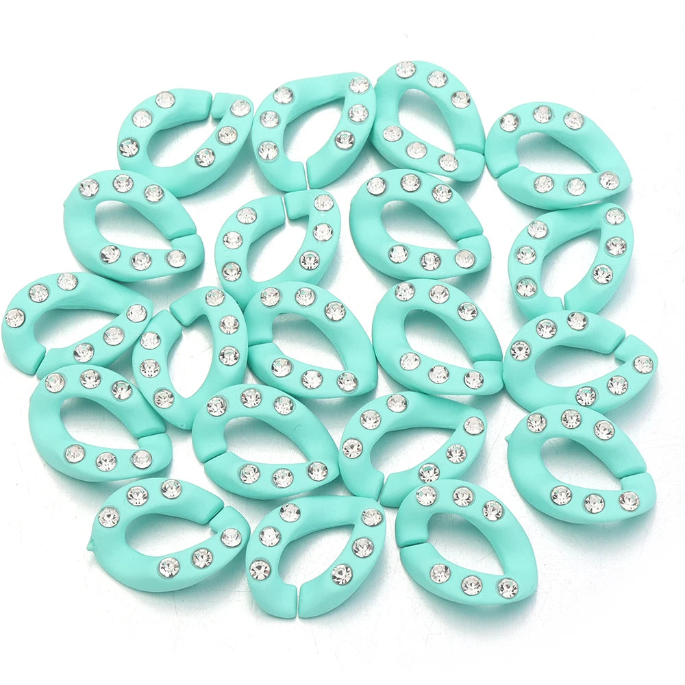 A collection of light mint green acrylic link chains for DIY jewelry making