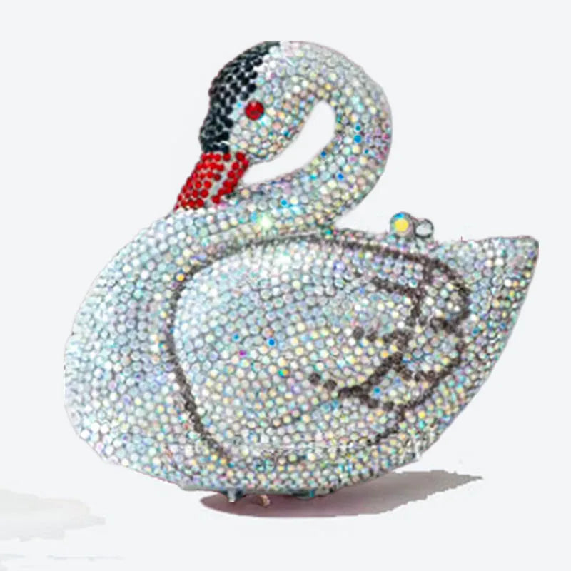 Pochette de soirée en cristal scintillant en cygne avec des pierres blanches et grises irisées.