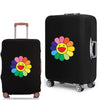 Black rolling suitcase with a colorful sunflower design on the side.