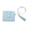 Light blue silicone bead bracelet with a wooden card holder and tassel.